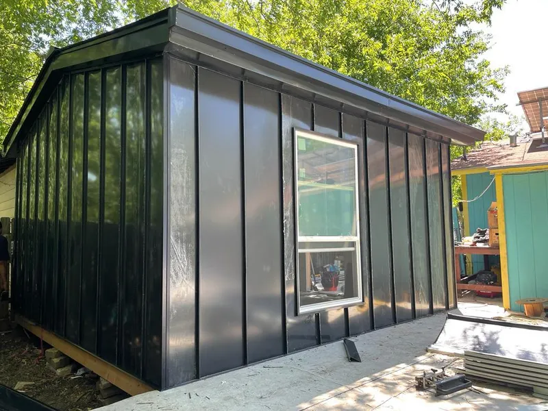 Black standing seam metal wall panels for Roof Inspection in Hazel Dell